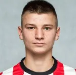 T. Bała