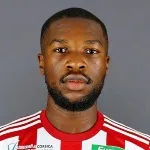 T. Njiké