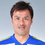 Y. Komano